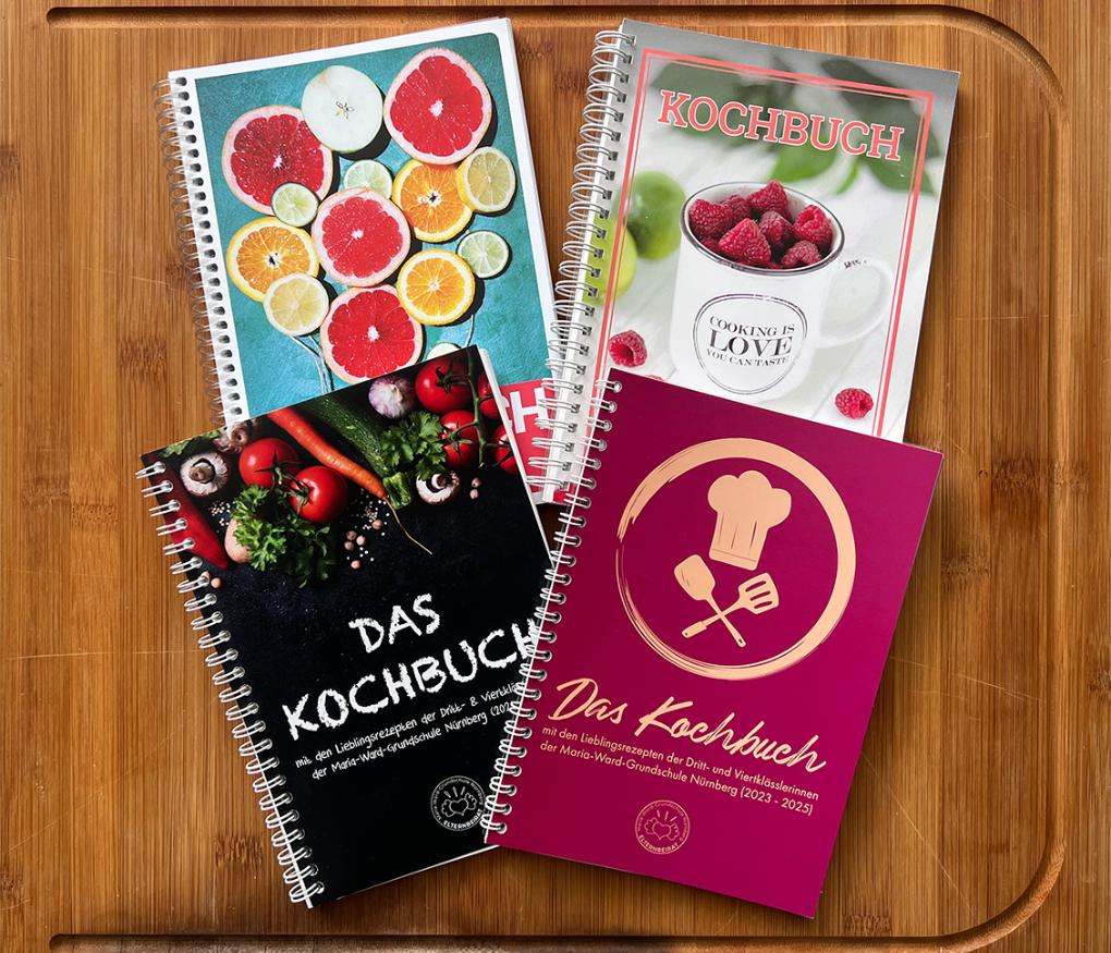 Vier Ausgaben von dem Kochbuch der Grundschule